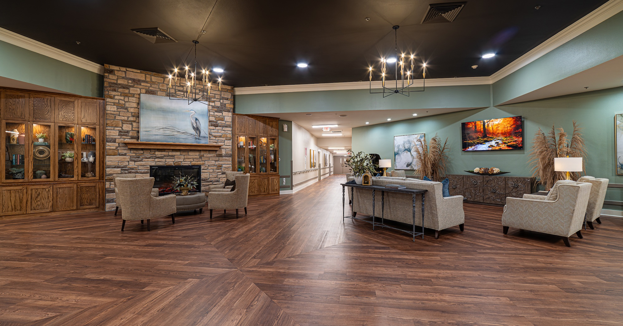 Decorated lobby with seats and TV